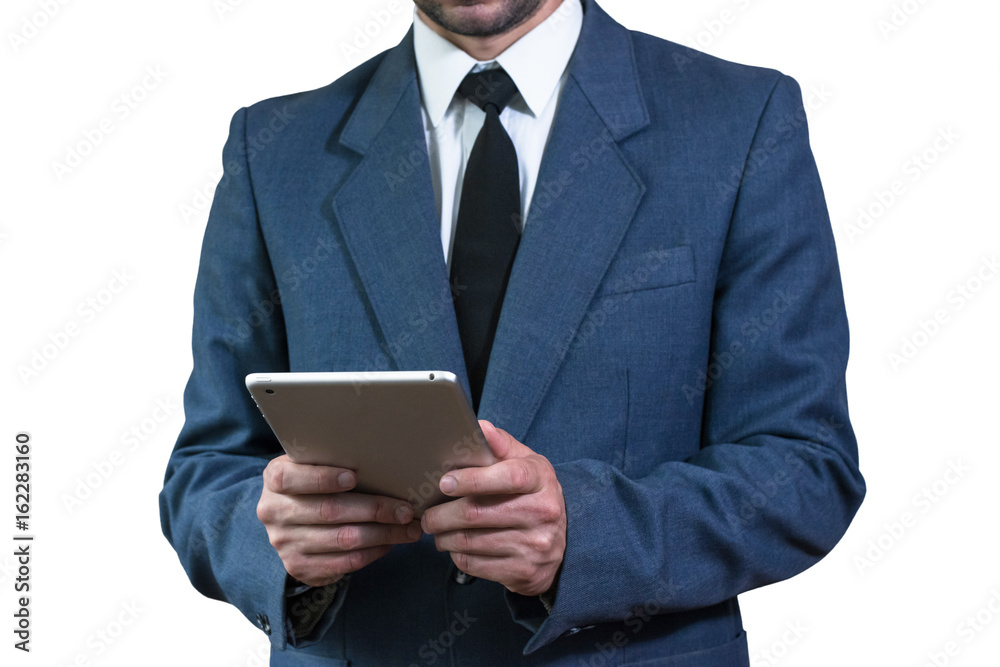 Young businessman in a jacket and white shirt, holding a tablet Young businessman in a jacket and white shirt, holding a tablet