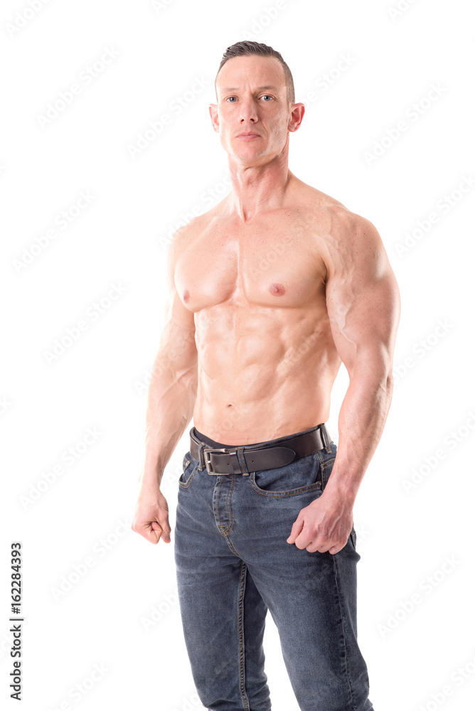 fit muscular man posing isolated in white fit muscular man posing isolated in white