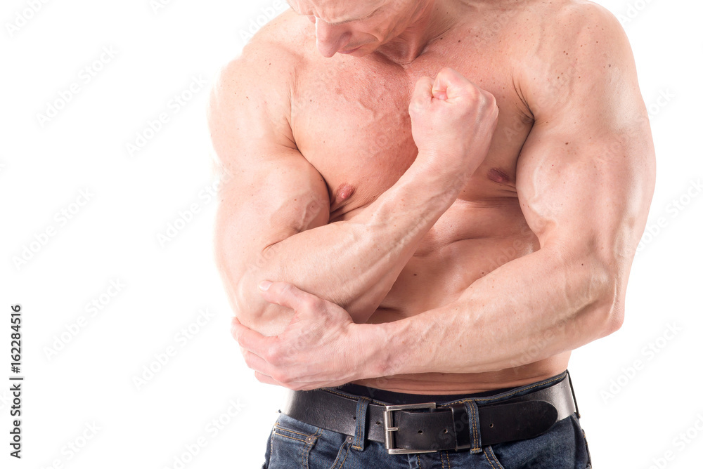 Naklejka premium fit muscular man posing isolated in white
