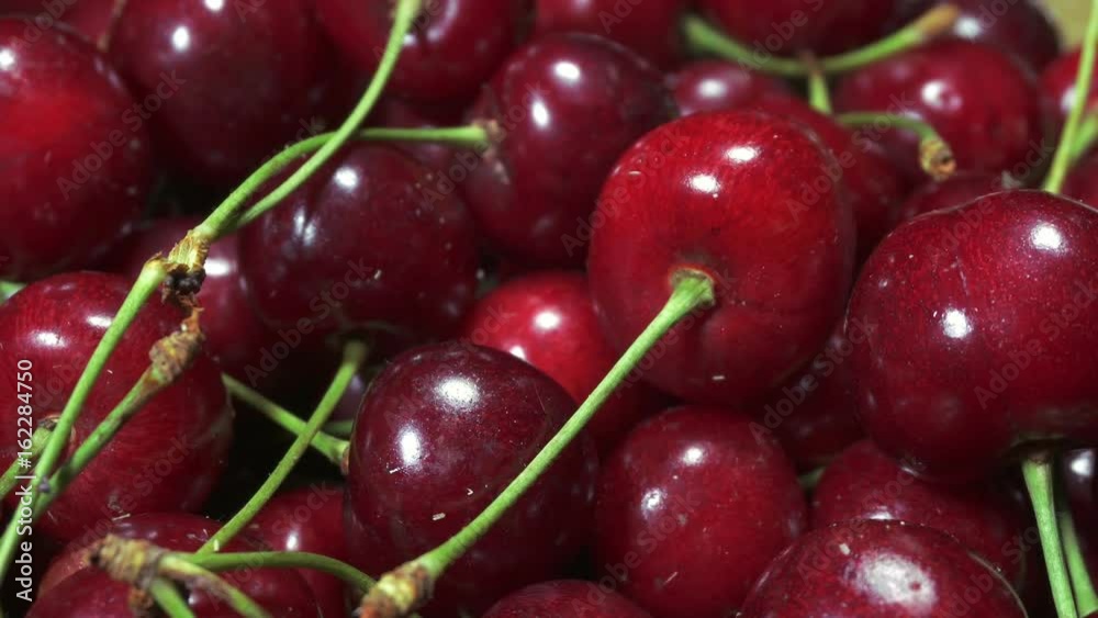 Great background of fresh, ripe, juicy cherries. Rotating turntable. Great background of fresh, ripe, juicy cherries. Rotating turntable.