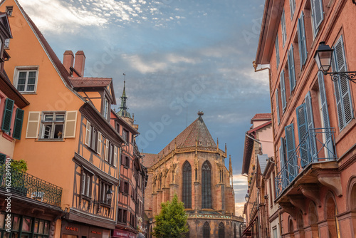 Street of Colmar, Alsace, France, with the cathedral in background