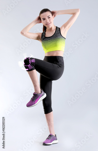 Young woman doing bicycle c...