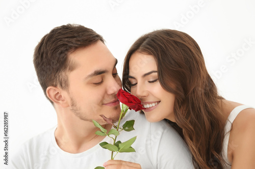 Beautiful couple with rose ...