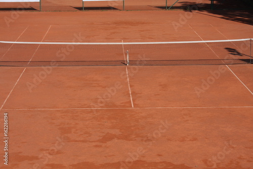 Tennis clay court with net © Miroslav110