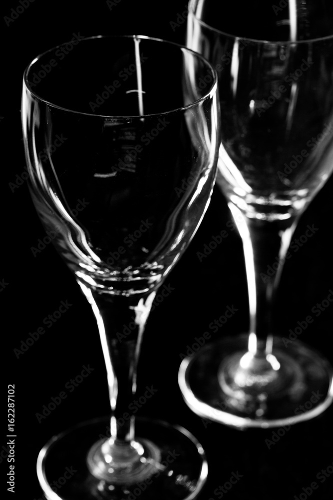 Two glasses with black background Two glasses with black background