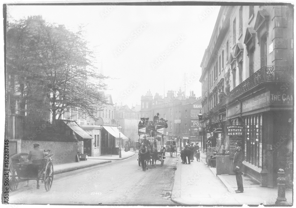 Street scene in Kensington  London. Date: 1906