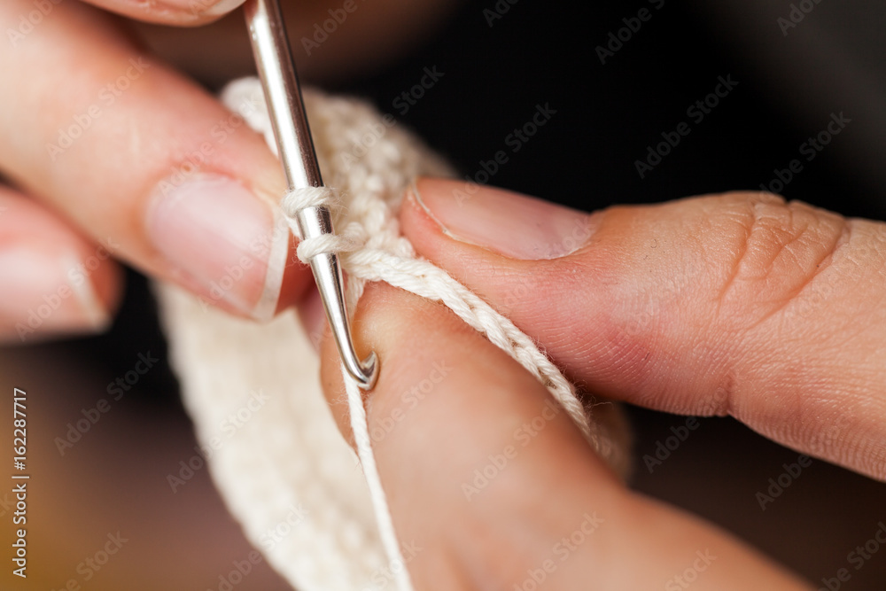 Woman hands knitting