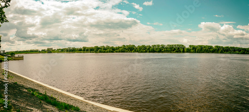 The shore of the grandiose Russian Volga river near the town of Uglich on a summer day. Yaroslavl region  