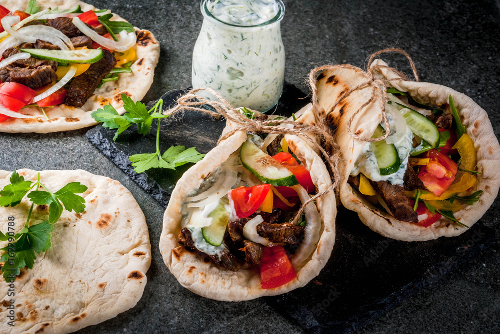 Healthy snack, lunch. Traditional Greek wrapped sandwich gyros