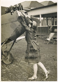 Woman Swings Propeller. Date: 1927