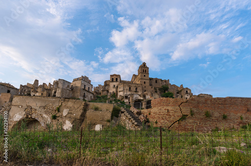 Craco  Italy  - The evocative ruins and landscapes of the ghost town scattered among the badlands hills of the Basilicata region  beside Matera  destroyed by a landslide and abandoned.
