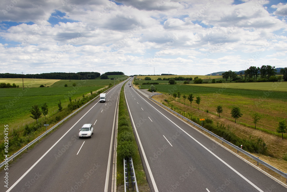 Highway transportation with cars and truck. View from above. Highway transportation with cars and truck. View from above.
