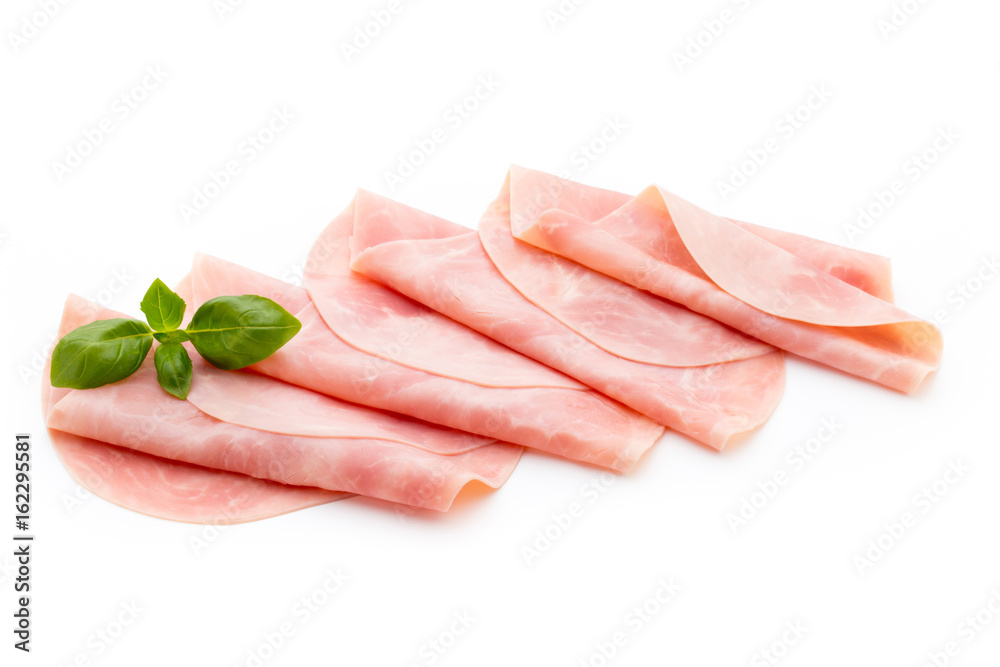 Thin slices of ham on white background. Thin slices of ham on white background.