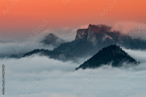 Poland landscape, Pieniny mountains in the sea of fog in the morning with Trzy Korony (Three Crowns) peak © tomeyk