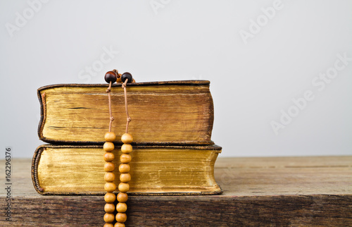 Rosary beads and breviary photo