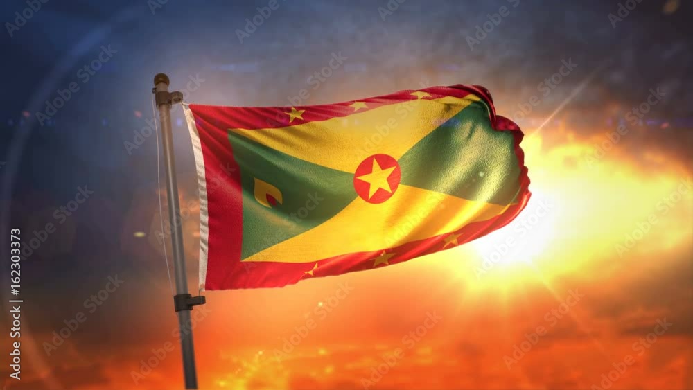 Grenada Flag Backlit At Beautiful Sunrise Loop Slow Motion 4K