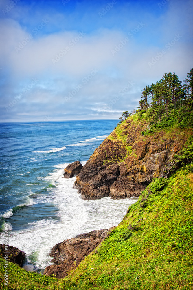 A coastal view from the North Head lighthouse in Cape Disappointment State Park in Washington, USA.  The North Head lighthouse was built to compliment the nearby Cape Disappointment lighthouse.