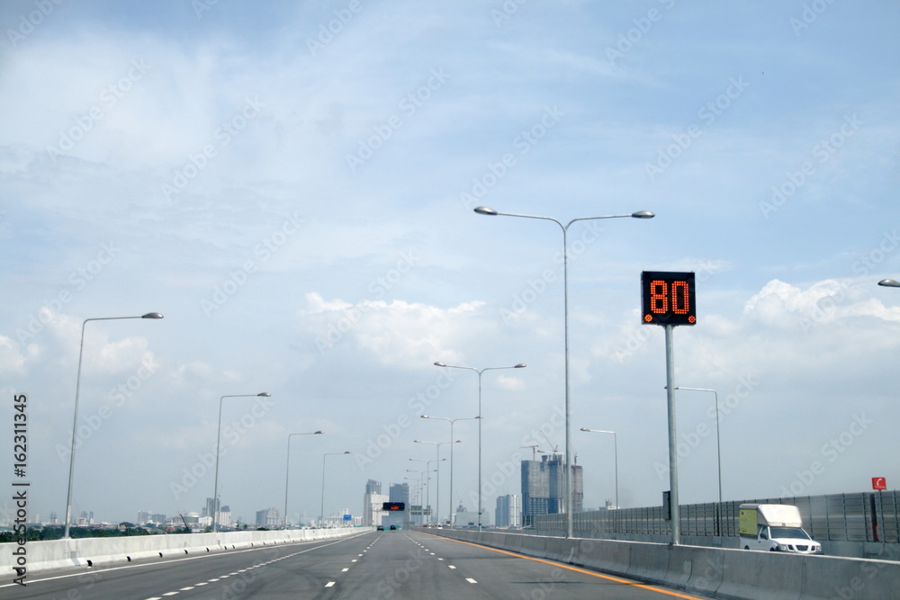 road of expressway in Bangkok, Thailand  have sign for reduce speed of car to 80 kilometer per hour