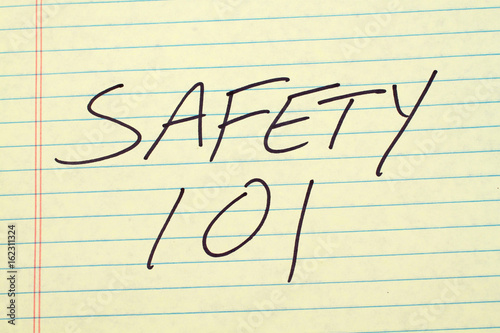 The words "Safety 101" on a yellow legal pad