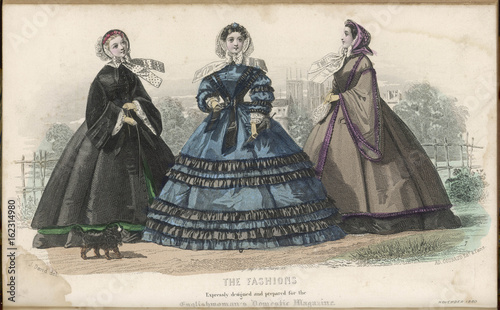 Victorian fashion. Women wearing dresses. Date: 1860 photo