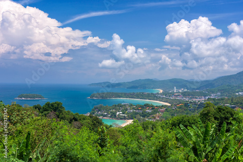 Fototapeta Naklejka Na Ścianę i Meble -  Tropical beach landscape with beautiful turquoise ocean waives and sandy coastline from high view point. Kata and Karon beaches, Phuket, Thailand