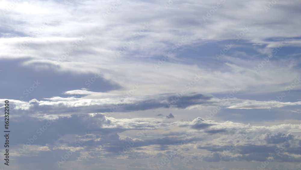 Cirrocumulus clouds on blue sky