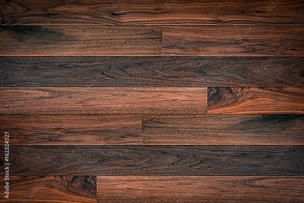 Naklejka premium Dark brown parquet wood texture background
