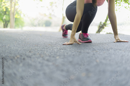 sport woman warming and stretching before jogging  sport concept  welness concep