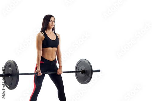 woman doing squat with barbell