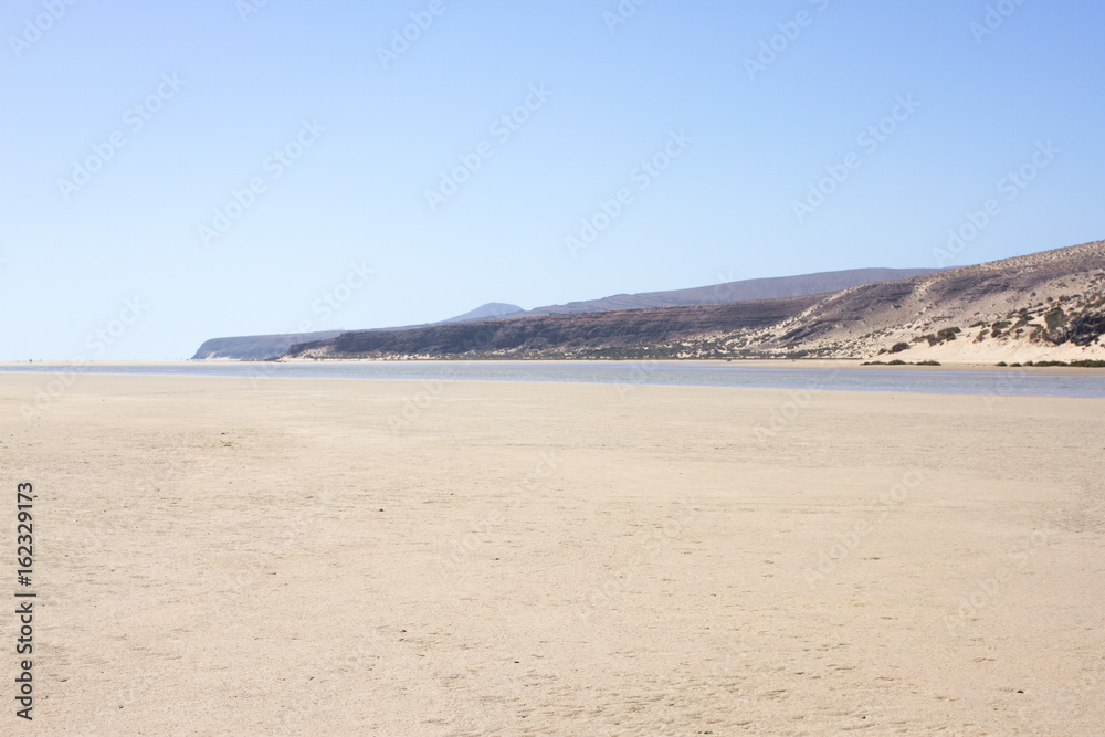 Incredible view of Costa Calma beach, blue clear lagoon. Playa Barca, Fuerteventura, Canary islands, Spain Incredible view of Costa Calma beach, blue clear lagoon. Playa Barca, Fuerteventura, Canary islands, Spain