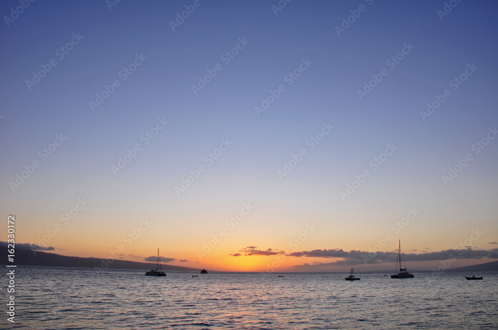 Hawaiian sunset with boats