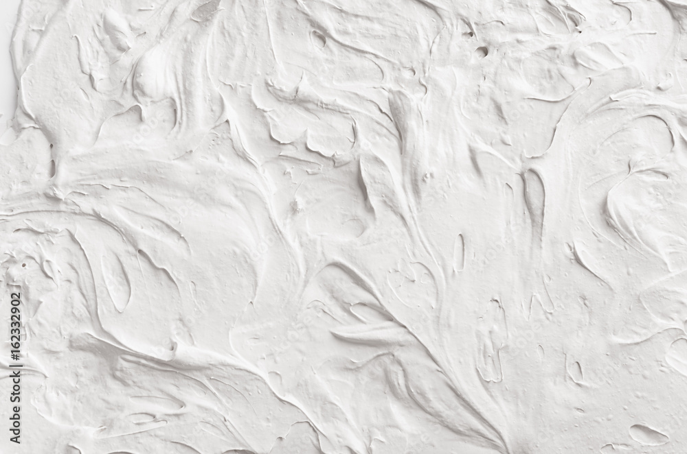Obraz premium White decorative abstract plaster texture with waves and surf.