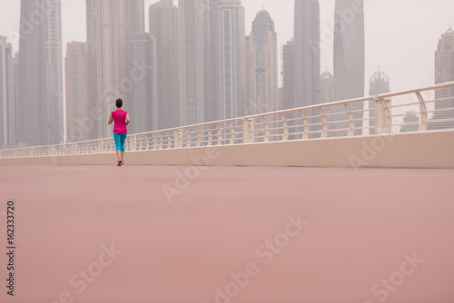 woman running on the promenade