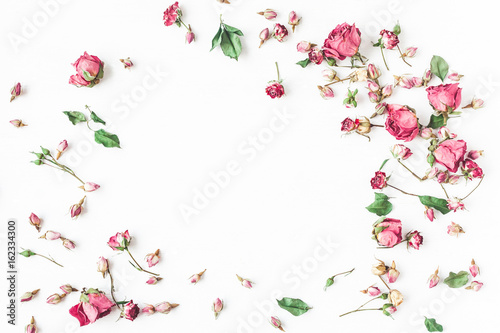 Wallpaper Mural Flowers composition. Frame made of dried rose flowers. Flat lay, top view Torontodigital.ca