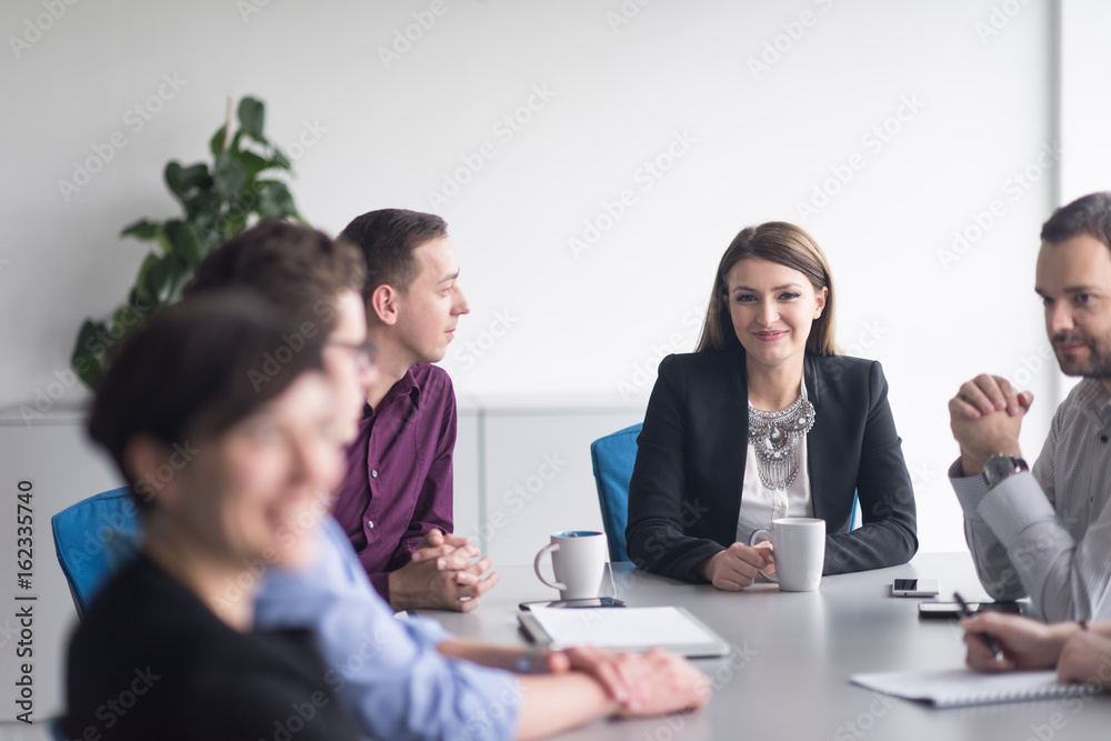Group of young people meeting in startup office Group of young people meeting in startup office