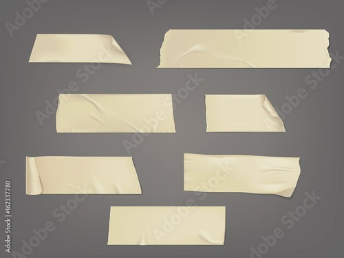 Vector illustration in a realistic style set of different slices of a adhesive tape with shadow and wrinkles isolated on a gray photo