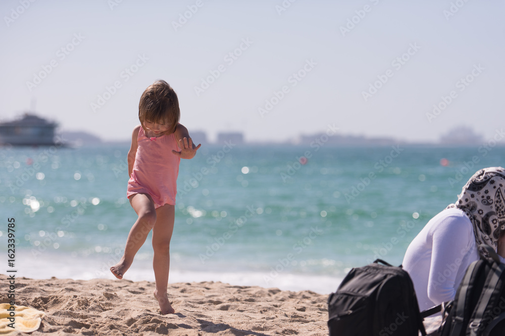 little cute girl at beach