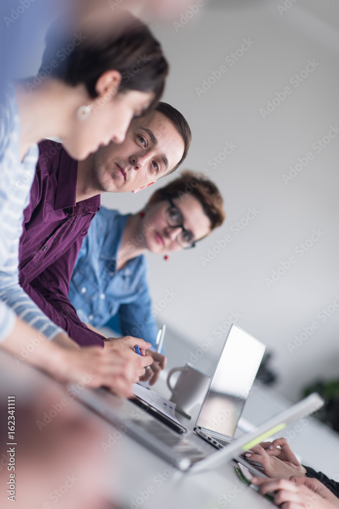 Group of young people meeting in startup office Group of young people meeting in startup office