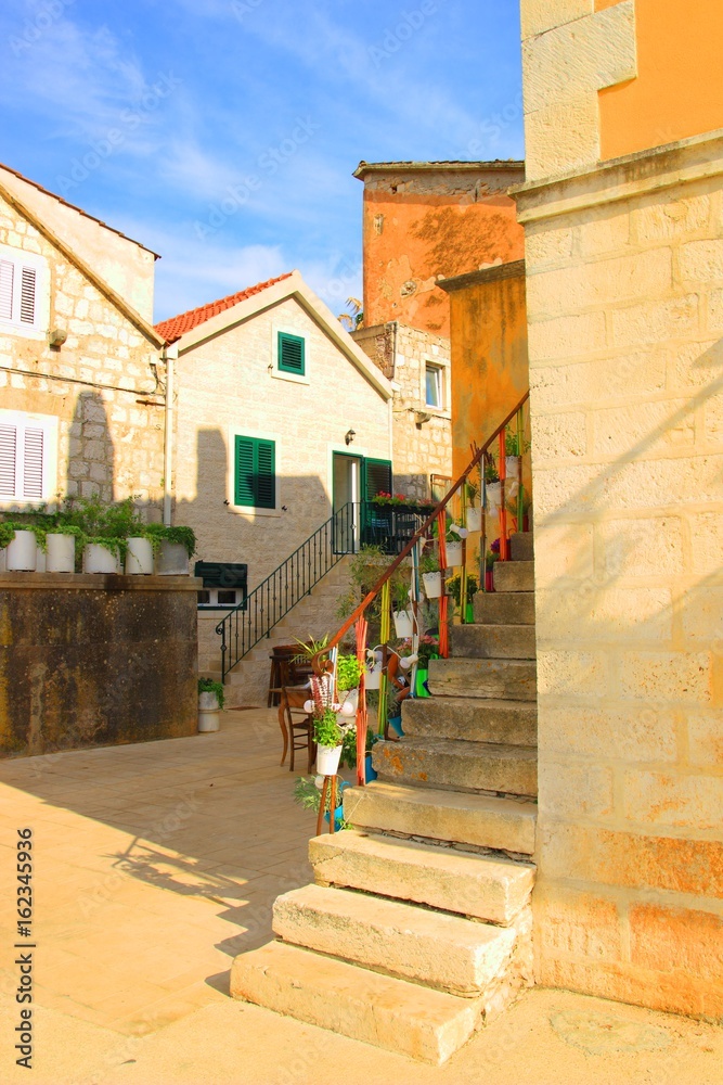 Ols street in Stari Grad on Isladn Hvar in Croatia, warm colors 