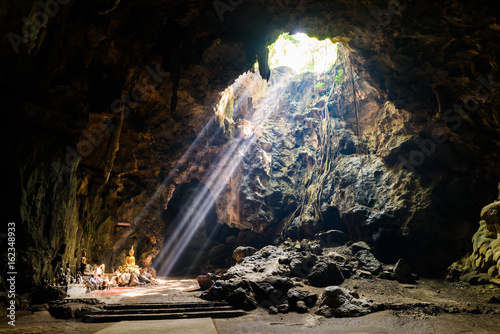 Fototapeta Naklejka Na Ścianę i Meble -  Sunbeam in buddha cave, Tham Khao Luang near Phetchaburi,Thailand