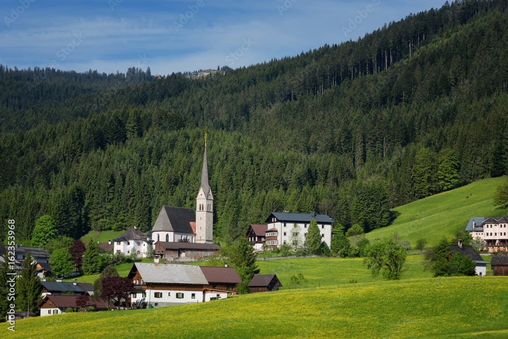Colorful outdoor scene in the Austrian Alps. Summer sunny day in the Gosau village on the Grosse Bischofsmutze mountain range, Austria, Europe. 