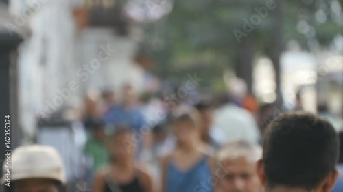 Wallpaper Mural Blurred unrecognizable people are walking around city center. Out of focus is backdrop of bustling big indian city with busy traffic Torontodigital.ca