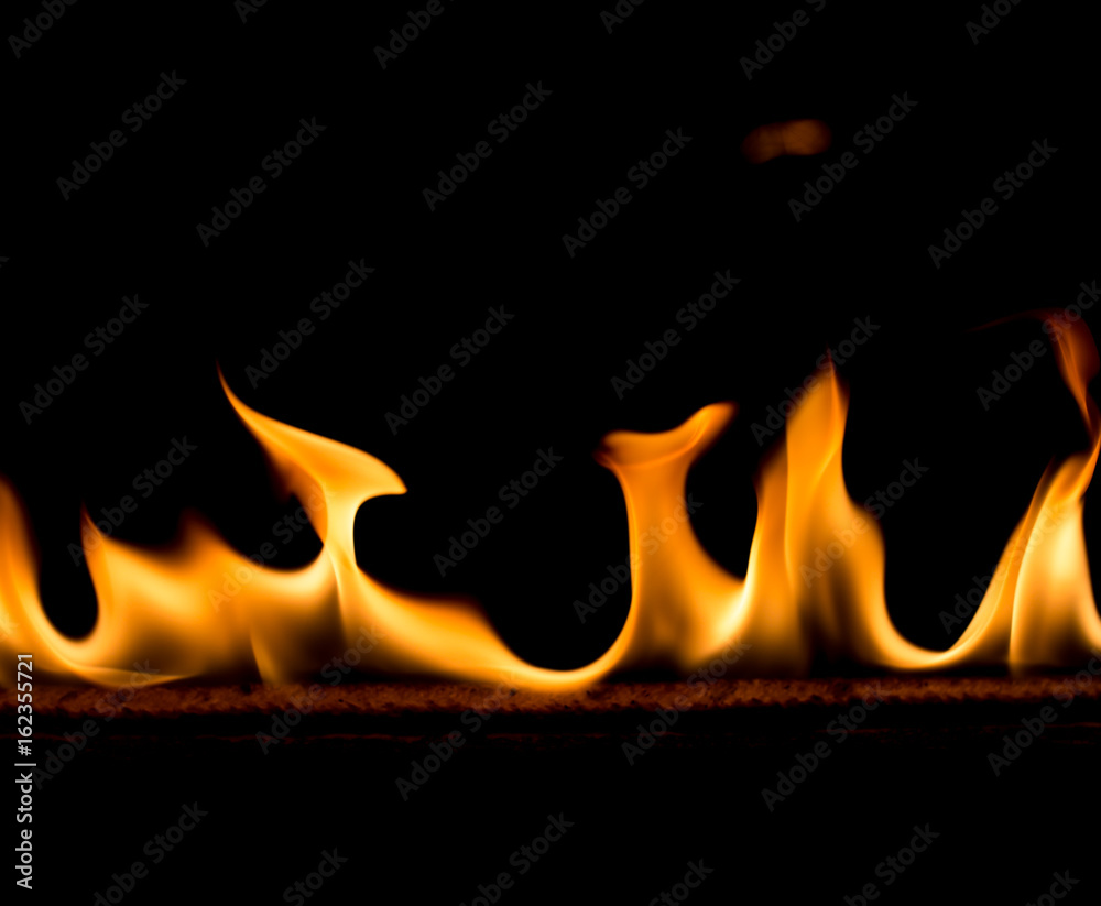 Strip of fire on a black background Strip of fire on a black background