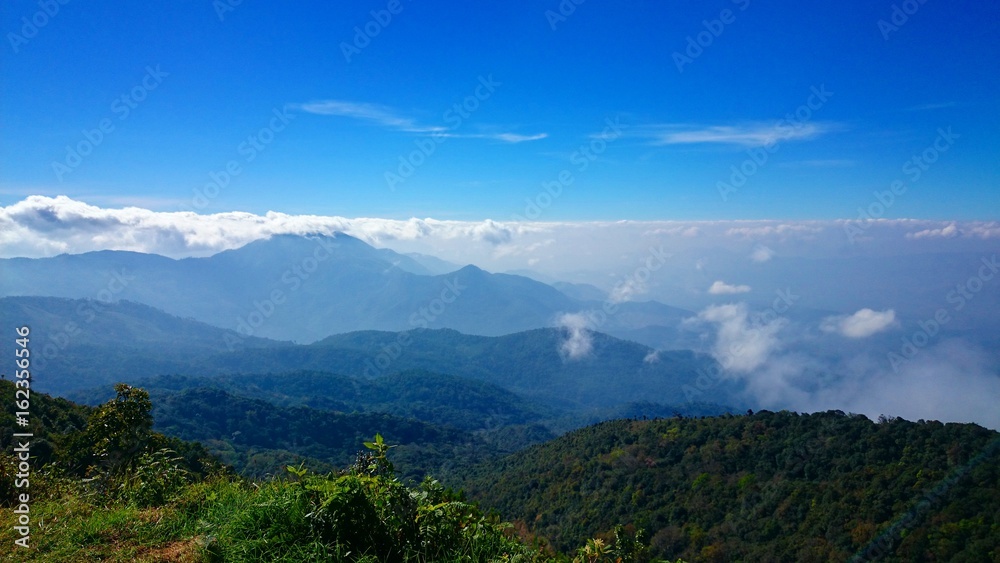 Beautiful mountains landscape and sky with clouds for background.