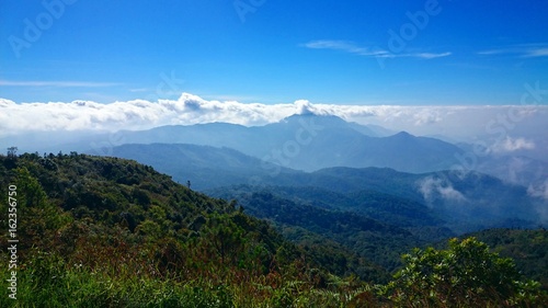 Beautiful mountains landscape and sky with clouds for background.