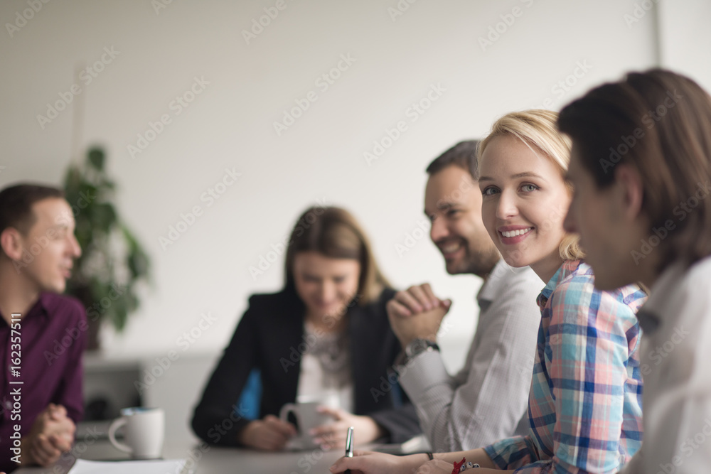 Fototapeta premium Group of young people meeting in startup office
