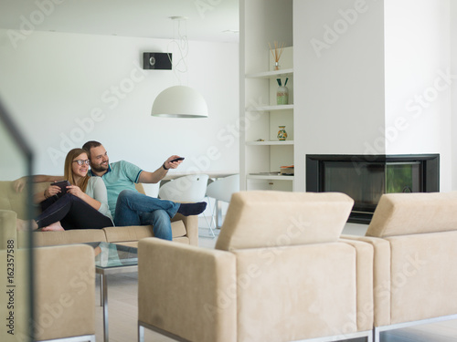 couple relaxes in the living room