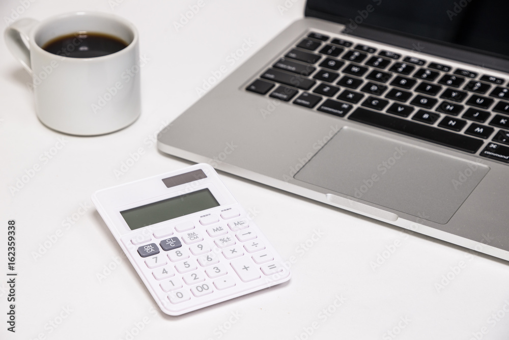 Laptop computer with calculator and coffee - パソコンと電卓とコーヒー Laptop computer with calculator and coffee - パソコンと電卓とコーヒー