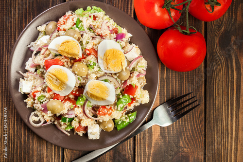Fresh salad with couscous and eggs