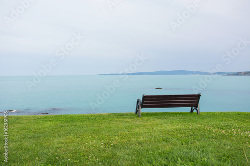 Lonely Bench At The Sea Shore 